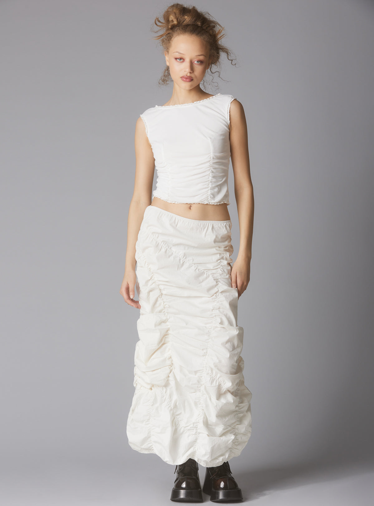 Sleeveless Top With Wide Neck & Ruffled Trim in - UNIF Special Offer