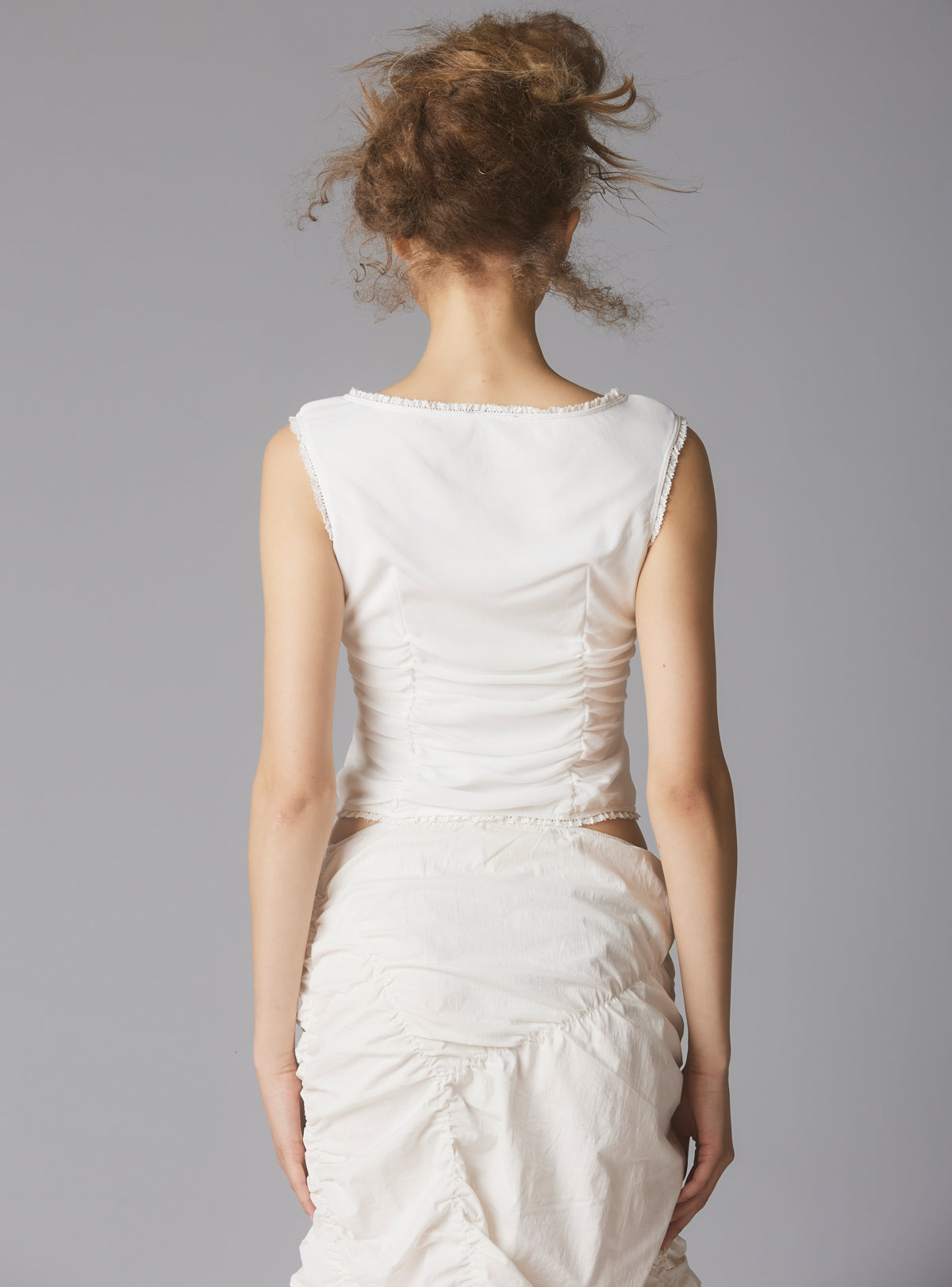 Sleeveless Top With Wide Neck & Ruffled Trim in - UNIF Special Offer