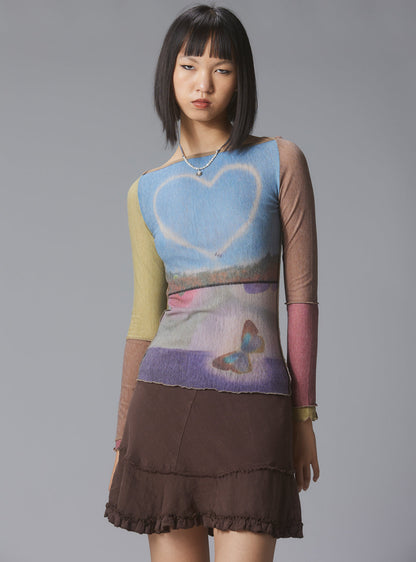 Skye Top Y2K allover-print mesh top with custom artwork - UNIF Sale