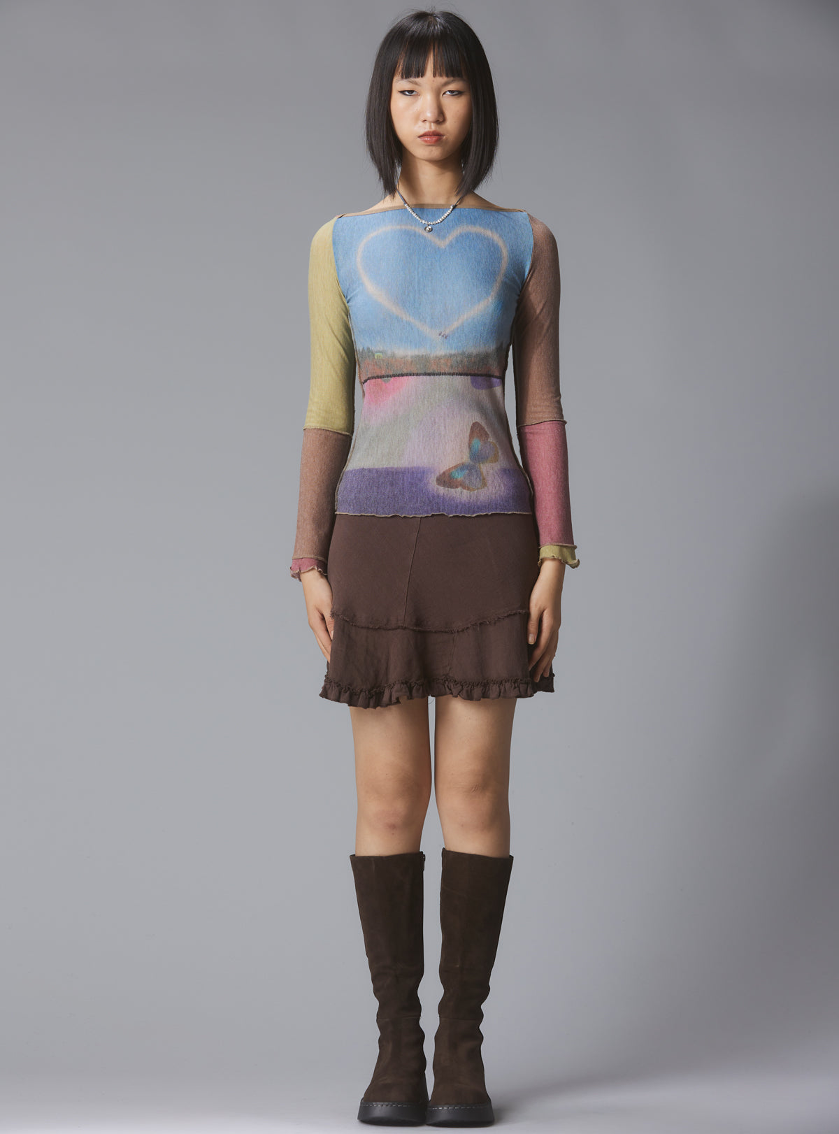 Skye Top Y2K allover-print mesh top with custom artwork - UNIF Sale