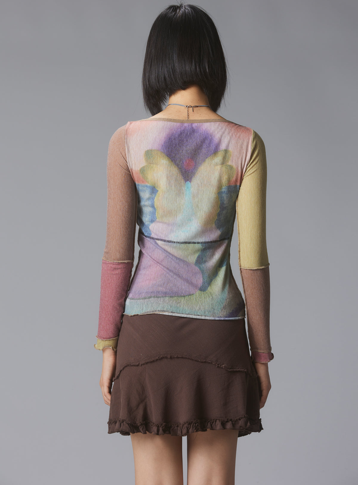 Skye Top Y2K allover-print mesh top with custom artwork - UNIF Sale